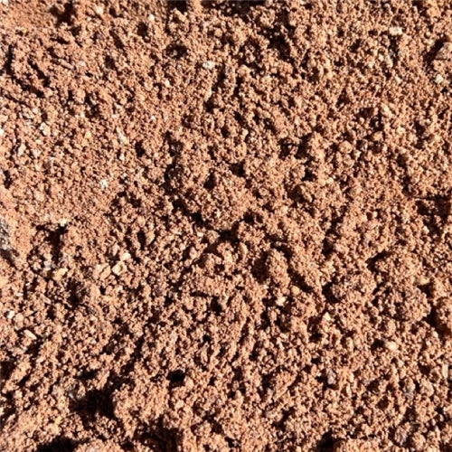 Pink sandstone dust close up — fine decorative aggregate Howard QLD