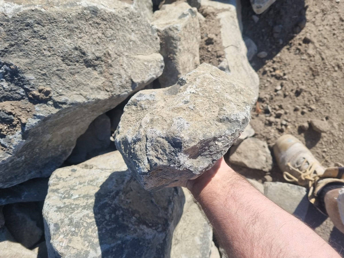 100-300mm grey rocks showing stone size and texture for garden borders and drainage channels QLD