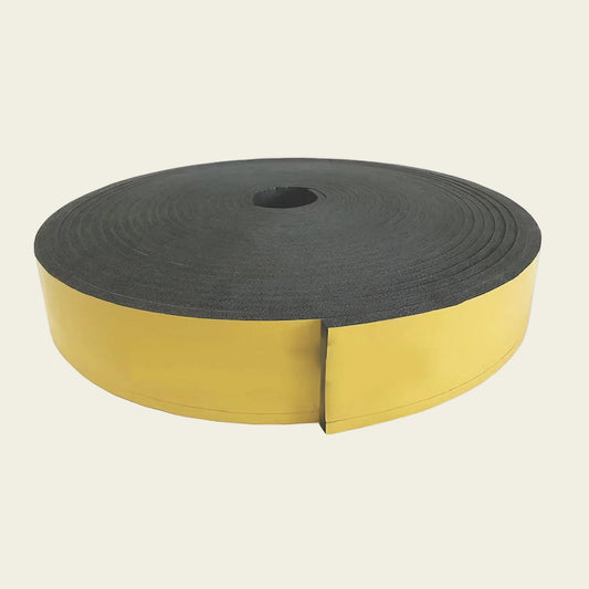Roll of black foam tape with yellow backing on a white background