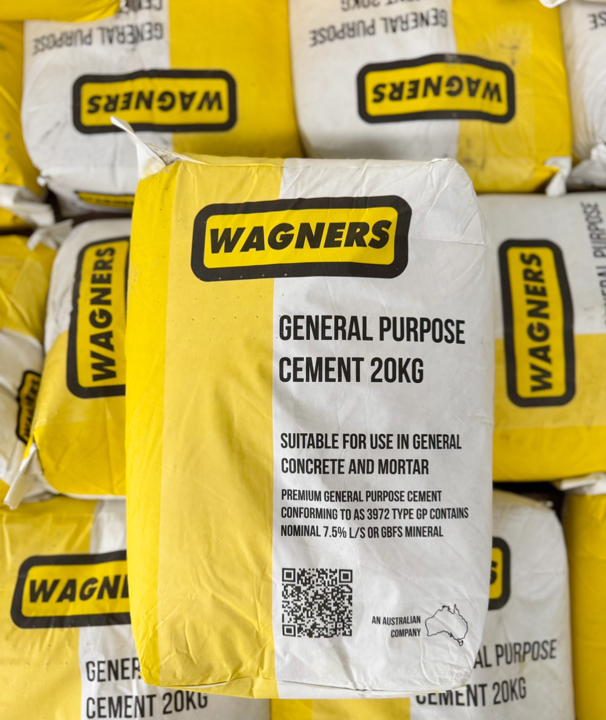 Bags of Wagners General Purpose Cement with yellow and black labels.