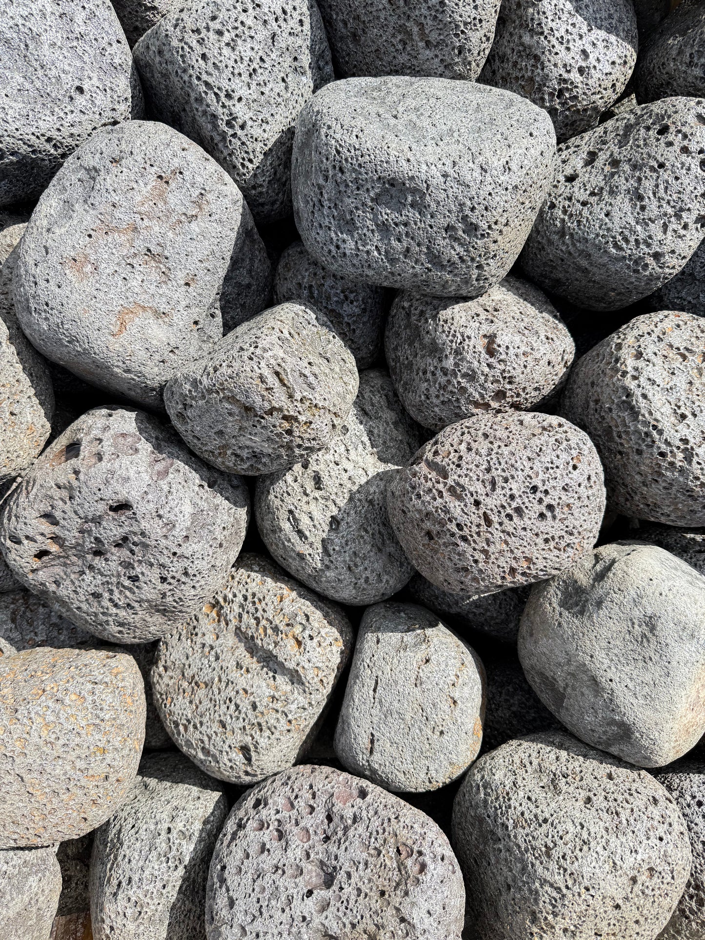 Volcanic lava rocks 150-250mm close-up — natural texture, Howard QLD