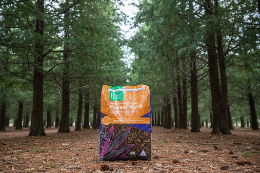 Bag of Cyrenaic Muck fertilizer in a forest setting