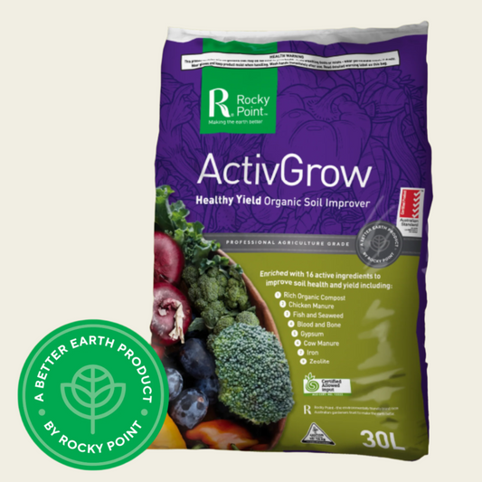 Bag of Rocky Point ActivGrow organic soil improver on a green background