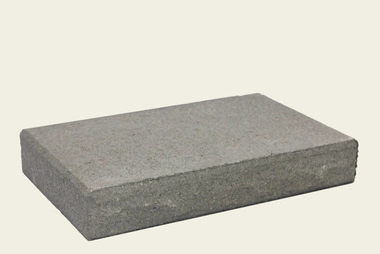 Rectangular concrete block on a white background